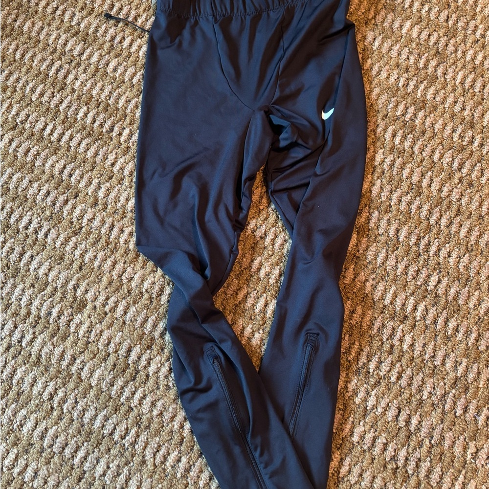Men’s Nike Dri-FIT Black Leggings with Metallic Logo. Gently used. Size small.